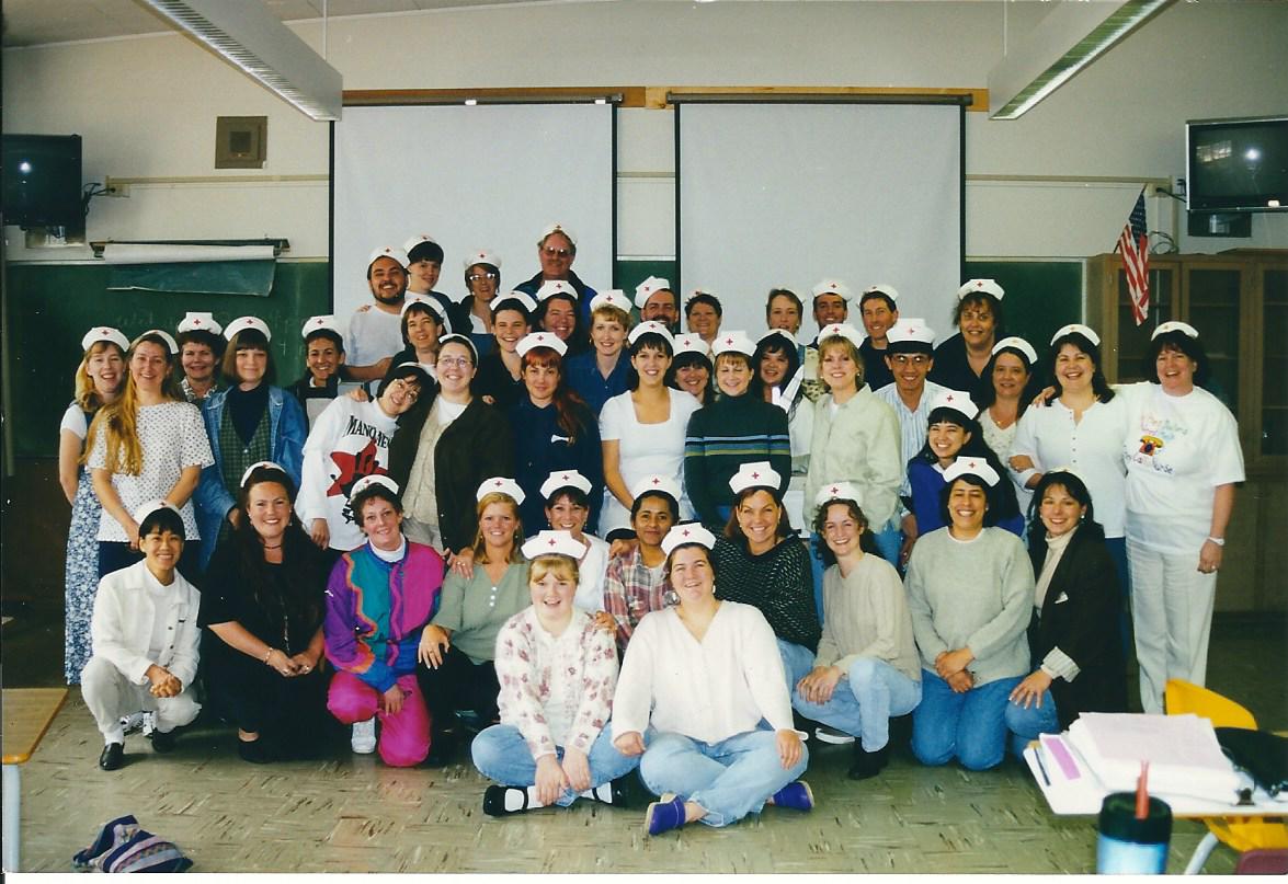 A class group photo of nursing students with military experience.